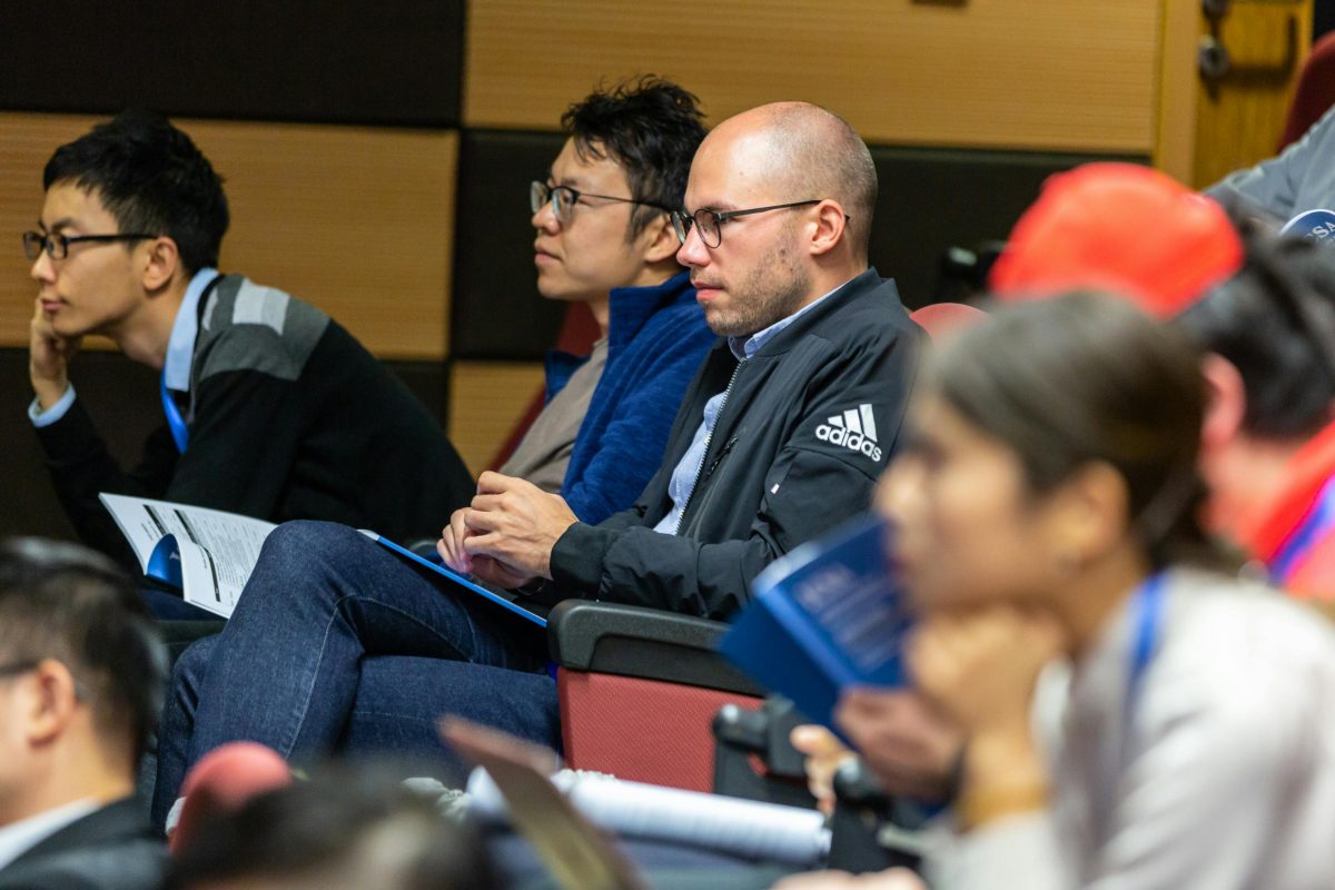 Students seated in a college lecture hall